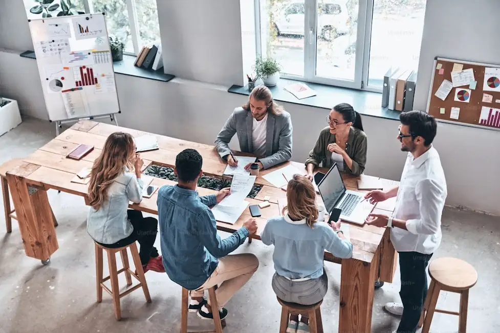 Team collaborating at a workshop table